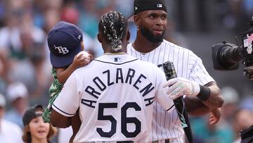 SEATTLE, WASHINGTON - JULY 10: Randy Arozarena #56 of the Tampa Bay Rays hugs Luis Robert Jr. #88 of the Chicago White Sox during the T-Mobile Home Run Derby at T-Mobile Park on July 10, 2023 in Seattle, Washington.   Steph Chambers/Getty Images/AFP (Photo by Steph Chambers / GETTY IMAGES NORTH AMERICA / Getty Images via AFP)