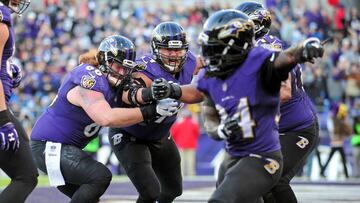 Dec 3, 2017; Baltimore, MD, USA; Baltimore Ravens running back Alex Collins (34) celebrates with offensive linemen Ryan Jensen (66) and James Hurst (74) after scoring a touchdown in the fourth quarter against the Detroit Lions at M&amp;T Bank Stadium. Mandatory Credit: Evan Habeeb-USA TODAY Sports