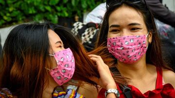 Mujeres usando m&aacute;scaras para protegerse del coromavirus. Febrero 3, 2020.