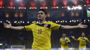 FILE - In this June 28, 2014 file photo, Colombia's James Rodriguez celebrates after scoring the opening goal during the World Cup round of 16 soccer match between Colombia and Uruguay, at the Maracana Stadium in Rio de Janeiro, Brazil. (AP Photo/Natacha Pisarenko, File)
