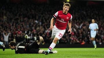 Arsenal&#039;s Russian midfielder Andrey Arshavin (C) celebrates scoring the third goal during the League Cup third round football match against Coventry City at the Emirates Stadium in London on September 26, 2012. AFP PHOTO/GLYN KIRK
 
 RESTRICTED TO EDITORIAL USE. No use with unauthorized audio, video, data, fixture lists, club/league logos or &acirc;??live&acirc;? services. Online in-match use limited to 45 images, no video emulation. No use in betting, games or single club/league/player publications.        (Photo credit should read GLYN KIRK/AFP/GettyImages)