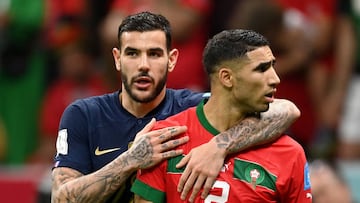 AL KHOR, QATAR - DECEMBER 14: Theo Hernandez of France looks on with Achraf Hakimi of Morocco during the FIFA World Cup Qatar 2022 semi final match between France and Morocco at Al Bayt Stadium on December 14, 2022 in Al Khor, Qatar. (Photo by David Ramos - FIFA/FIFA via Getty Images)