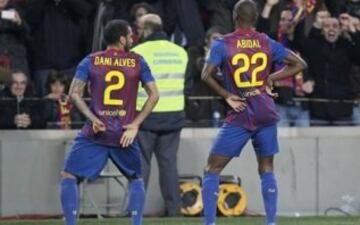 Dani Alves y Éric Abidal.