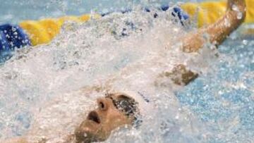 Phelps eliminado en 50 libre y segundo en 100 espalda