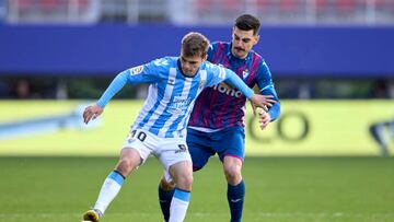 EIBAR, SPAIN - JANUARY 15: Aleix Febas of Malaga CF compete for the ball with Sergio Alvarez of SD Eibar during the LaLiga Smartbank match between SD Eibar and Malaga CF at Estadio Municipal de Ipurua on January 15, 2023 in Eibar, Spain. (Photo by Ion Alcoba/Quality Sport Images/Getty Images)