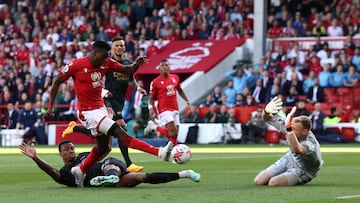 Nottingham Forest's Nigerian striker Taiwo Awoniyi scores the opening goal during the English Premier League football match between Nottingham Forest and Arsenal at The City Ground in Nottingham, central England, on May 20, 2023. (Photo by Darren Staples / AFP) / RESTRICTED TO EDITORIAL USE. No use with unauthorized audio, video, data, fixture lists, club/league logos or 'live' services. Online in-match use limited to 120 images. An additional 40 images may be used in extra time. No video emulation. Social media in-match use limited to 120 images. An additional 40 images may be used in extra time. No use in betting publications, games or single club/league/player publications. /
