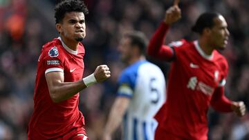 Liverpool's Colombian midfielder #07 Luis Diaz celebrates after scoring his team first goal during the English Premier League football match between Liverpool and Brighton and Hove Albion at Anfield in Liverpool, north west England on March 31, 2024. (Photo by Paul ELLIS / AFP) / RESTRICTED TO EDITORIAL USE. No use with unauthorized audio, video, data, fixture lists, club/league logos or 'live' services. Online in-match use limited to 120 images. An additional 40 images may be used in extra time. No video emulation. Social media in-match use limited to 120 images. An additional 40 images may be used in extra time. No use in betting publications, games or single club/league/player publications. /