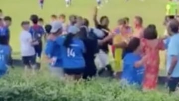 Attempted stabbing as parents fight at kids' soccer tournament.