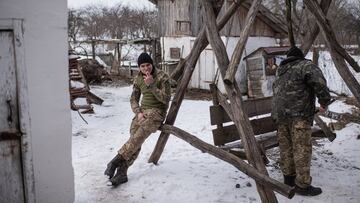 BILA KRYNYTSIA, UKRAINE - MARCH 5: Maksym Hrynchuk, 23, smokes by the Hrynchuk family&#039;s house in Bila Krynytsia village, Chernivtsi region, Ukraine, a day before his older brother Denys&#039;s funeral. Denys Hrynchuk served in the Ukrainian army. He 