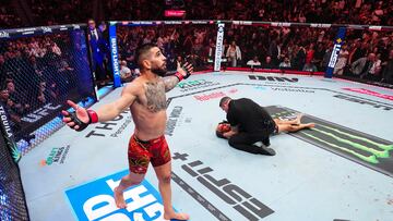 LAS VEGAS, NEVADA - JUNE 28: Ilia Topuria of Spain reacts to his win over Charles Oliveira of Brazil in the UFC lightweight championship bout during the UFC 317 event at T-Mobile Arena on June 28, 2025 in Las Vegas, Nevada. (Photo by Jeff Bottari/Zuffa LLC)