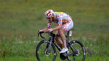 Uno-X Mobility team's Norwegian rider Jonas Abrahamsen wearing the climber's polka dot (dotted) jersey cycles in a breakaway during the 8th stage of the 111th edition of the Tour de France cycling race, 183,5 km between Semur-en-Auxois and Colombey-les-deux-Eglises, on July 6, 2024. (Photo by Thomas SAMSON / AFP)