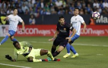 Kameni y Luis Suárez.