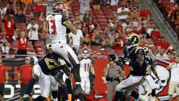 Sep 25, 2016; Tampa, FL, USA; Tampa Bay Buccaneers wide receiver Mike Evans (13) catches the ball for a touchdown against the Los Angeles Rams during the second half at Raymond James Stadium. Mandatory Credit: Kim Klement-USA TODAY Sports