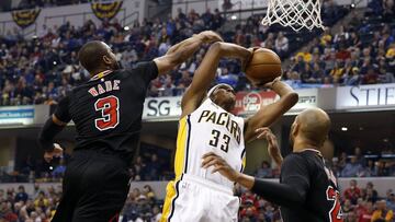 Dec 30, 2016; Indianapolis, IN, USA; Indiana Pacers center Myles Turner (33) takes a shot against Chicago Bulls guard Dwayne Wade (3) at Bankers Life Fieldhouse. Mandatory Credit: Brian Spurlock-USA TODAY Sports