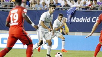 Asensio, en primer término, en una jugada del pasado miércoles contra el PSG.