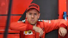 Ferrari&#039;s German driver Sebastian Vettel looks on during the tests for the new Formula One Grand Prix season at the Circuit de Catalunya in Montmelo in the outskirts of Barcelona on February 21, 2020. (Photo by LLUIS GENE / AFP)