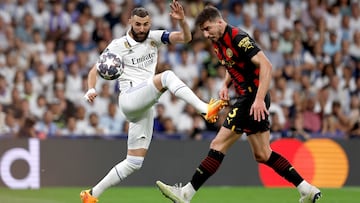 Benzema and Rúben Dias, in a play from the first leg between Real Madrid and Manchester City.