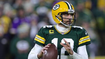 GREEN BAY, WISCONSIN - JANUARY 01: Aaron Rodgers #12 of the Green Bay Packers drops back to pass during the third quarter against the Minnesota Vikings at Lambeau Field on January 01, 2023 in Green Bay, Wisconsin. Stacy Revere/Getty Images/AFP (Photo by Stacy Revere / GETTY IMAGES NORTH AMERICA / Getty Images via AFP)