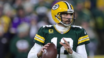 GREEN BAY, WISCONSIN - JANUARY 01: Aaron Rodgers #12 of the Green Bay Packers drops back to pass during the third quarter against the Minnesota Vikings at Lambeau Field on January 01, 2023 in Green Bay, Wisconsin.   Stacy Revere/Getty Images/AFP (Photo by Stacy Revere / GETTY IMAGES NORTH AMERICA / Getty Images via AFP)