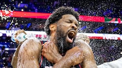 Philadelphia 76ers center Joel Embiid (21) is doused with water by teammates after scoring 70 points in a victory against the San Antonio Spurs at Wells Fargo Center.