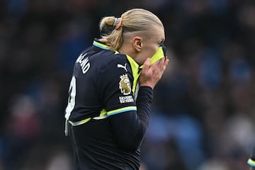 Manchester City's Norwegian striker #09 Erling Haaland reacts to their defeat on the pitch after the English Premier League football match between Aston Villa and Manchester City at Villa Park in Birmingham, central England on December 21, 2024. Villa won the game 2-1. (Photo by Paul ELLIS / AFP) / RESTRICTED TO EDITORIAL USE. No use with unauthorized audio, video, data, fixture lists, club/league logos or 'live' services. Online in-match use limited to 120 images. An additional 40 images may be used in extra time. No video emulation. Social media in-match use limited to 120 images. An additional 40 images may be used in extra time. No use in betting publications, games or single club/league/player publications. / 