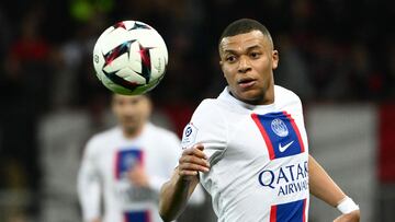 Paris Saint-Germain's French forward Kylian Mbappe looks at the ball during the French L1 football match between Nice (OGCN) and Paris Saint-Germain (PSG) at the Allianz Riviera stadium in Nice, on April 8, 2023. (Photo by CHRISTOPHE SIMON / AFP)