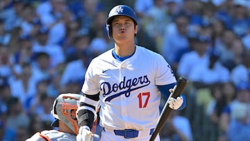 Oct 14, 2024; Los Angeles, California, USA; Los Angeles Dodgers designated hitter Shohei Ohtani (17) reacts after flying out against the New York Mets in the fifth inning during game two of the NLCS for the 2024 MLB Playoffs at Dodger Stadium. Mandatory Credit: Jayne Kamin-Oncea-Imagn Images