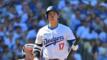 Oct 14, 2024; Los Angeles, California, USA; Los Angeles Dodgers designated hitter Shohei Ohtani (17) reacts after flying out against the New York Mets in the fifth inning during game two of the NLCS for the 2024 MLB Playoffs at Dodger Stadium. Mandatory Credit: Jayne Kamin-Oncea-Imagn Images