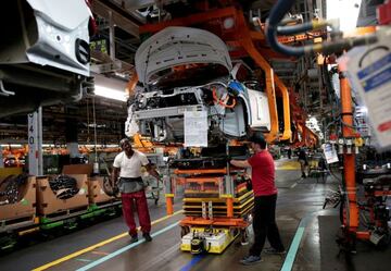 General Motors assembly workers on the assembly line at Orion Assembly in Lake Orion, Michigan.