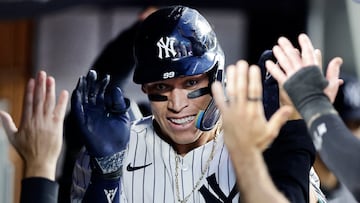NEW YORK, NEW YORK - JUNE 08: Aaron Judge #99 of the New York Yankees celebrates his third inning home run against the Los Angeles Dodgers with his teammates in the dugout at Yankee Stadium on June 08, 2024 in New York City. Jim McIsaac/Getty Images/AFP (Photo by Jim McIsaac / GETTY IMAGES NORTH AMERICA / Getty Images via AFP)