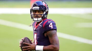 (FILES) In this file photo taken on January 3, 2021 Deshaun Watson #4 of the Houston Texans in action against the Tennessee Titans during a game at NRG Stadium in Houston, Texas. - Houston Texans quarterback DeShaun Watson will not face criminal prosecuti