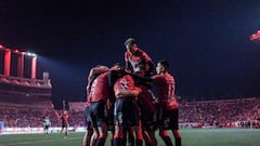Tijuana players celebrate after scoring against Pachuca during their Mexican Closura 2023 tournament football match at the Caliente stadium in Tijuana, Baja California state, Mexico, on February 26, 2023. (Photo by Guillermo Arias / AFP)