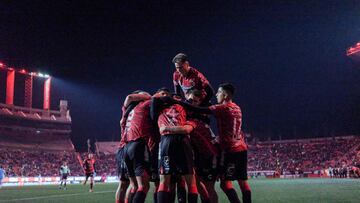 Tijuana players celebrate after scoring against Pachuca during their Mexican Closura 2023 tournament football match at the Caliente stadium in Tijuana, Baja California state, Mexico, on February 26, 2023. (Photo by Guillermo Arias / AFP)
