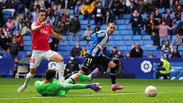 BARCELONA, SPAIN - MARCH 20: Raul de Tomas of Espanyol misses a chance past Martin Valjent and Sergio Rico of Real Mallorca during the LaLiga Santander match between RCD Espanyol and RCD Mallorca at RCDE Stadium on March 20, 2022 in Barcelona, Spain. (Pho