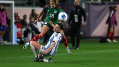 Feb 20, 2024; Carson, California, USA; Mexico forward Jasmine Casarez (18) passes the ball over Argentina defender Sophia Braun (13) during the second half of the 2024 Concacaf W Gold Cup group stage game at Dignity Health Sports Park. Mandatory Credit: Kiyoshi Mio-USA TODAY Sports