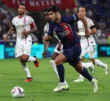 Asensio, durante un partido con el PSG ante el Olympique de Lyon.
