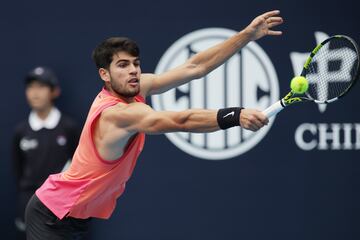 Carlos Alcaraz in action during his first round match against Giovanni Mpetshi Perricard.