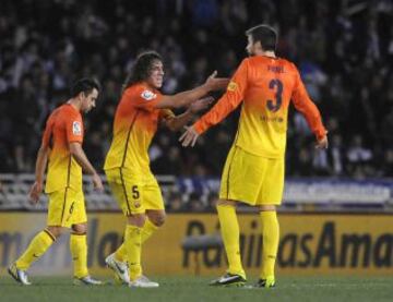 Jornada 20 / REAL SOCIEDAD - BARCELONA  Puyol increpa a su compañero Gerard Pique tras uno de los goles, de la Real Sociedad, el partido terminó con el resultado de 3-2.