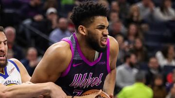 Mar 19, 2019; Minneapolis, MN, USA; Minnesota Timberwolves center Karl-Anthony Towns (32) is fouled by Golden State Warriors guard Klay Thompson (11) during the first quarter at Target Center. Mandatory Credit: Brace Hemmelgarn-USA TODAY Sports