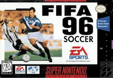 Ronald de Boer y Jason McAteer pelean por el balón en la portada de FIFA 96, en este caso de la versión de Super Nintendo.