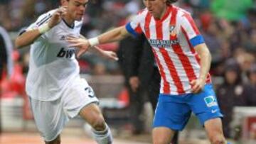 Filipe Luis, ante Pepe.