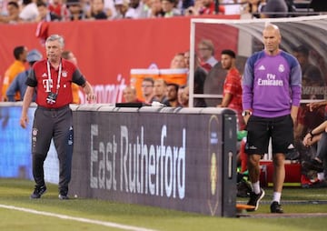 Bayern coach Carlo Ancelotti (left) and Real boss Zinedine Zidane - Ancelotti's assistant during the Italian's tenure at the Bernabéu - look on at Metlife Stadium.