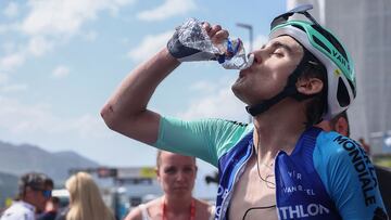 Decathlon AG2R La Mondiale Team's French rider Paul Seixas drinks from a bottle at the end of the 7th stage of the 77th edition of the Criterium du Dauphine cycling race, 131,6 km between Grand-Aigueblanche and Valmeinier, on June 14, 2025. (Photo by Anne-Christine POUJOULAT / AFP)