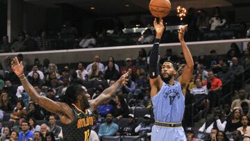 Oct 19, 2018; Memphis, TN, USA; Memphis Grizzlies guard Garrett Temple (17) shoots against Atlanta Hawks forward Taurean Prince (12) during the second half at FedExForum. the Memphis Grizzlies defeated the Atlanta Hawks 131-117. Mandatory Credit: Justin Ford-USA TODAY Sports