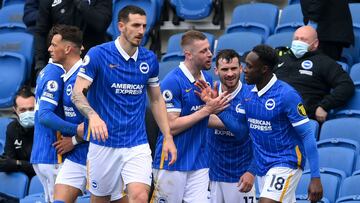 BRIGHTON, ENGLAND - MAY 01: Danny Welbeck of Brighton and Hove Albion celebrates with Adam Webster and Pascal Gross after scoring their side's second goal during the Premier League match between Brighton & Hove Albion and Leeds United at American