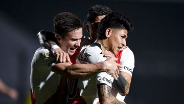 JUNIN, ARGENTINA - AUGUST 30: Jorge Carrascal of River Plate celebrates with teammate Agustín Palavecino (L) after scoring the first goal of his team during a match between Sarmiento and River Plate as part of Torneo Liga Profesional 2021 at Estad
