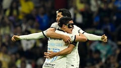 Club America's Alejandro Zendejas (L) celebrates with his teammates after scoring a goal against Cruz Azul during their Clausura 2023 Mexican Tournament match at the Azteca stadium in Mexico City on April 15, 2023. (Photo by ALFREDO ESTRELLA / AFP)
