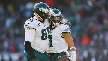 CHICAGO, ILLINOIS - DECEMBER 18: Jalen Hurts #1 of the Philadelphia Eagles celebrates a touchdown during the third quarter with Lane Johnson #65 in the game against the Chicago Bears at Soldier Field on December 18, 2022 in Chicago, Illinois.   Michael Reaves/Getty Images/AFP (Photo by Michael Reaves / GETTY IMAGES NORTH AMERICA / Getty Images via AFP)