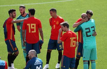 Spain's players share a joke before their official photo.