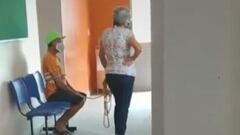 Una mujer ata con una cuerda a su marido y lo obliga a vacunarse.